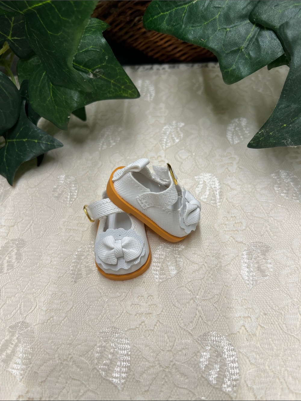 White 2”, 5 cm, Mary Jane Shoes with White Bow for 12” Doll.